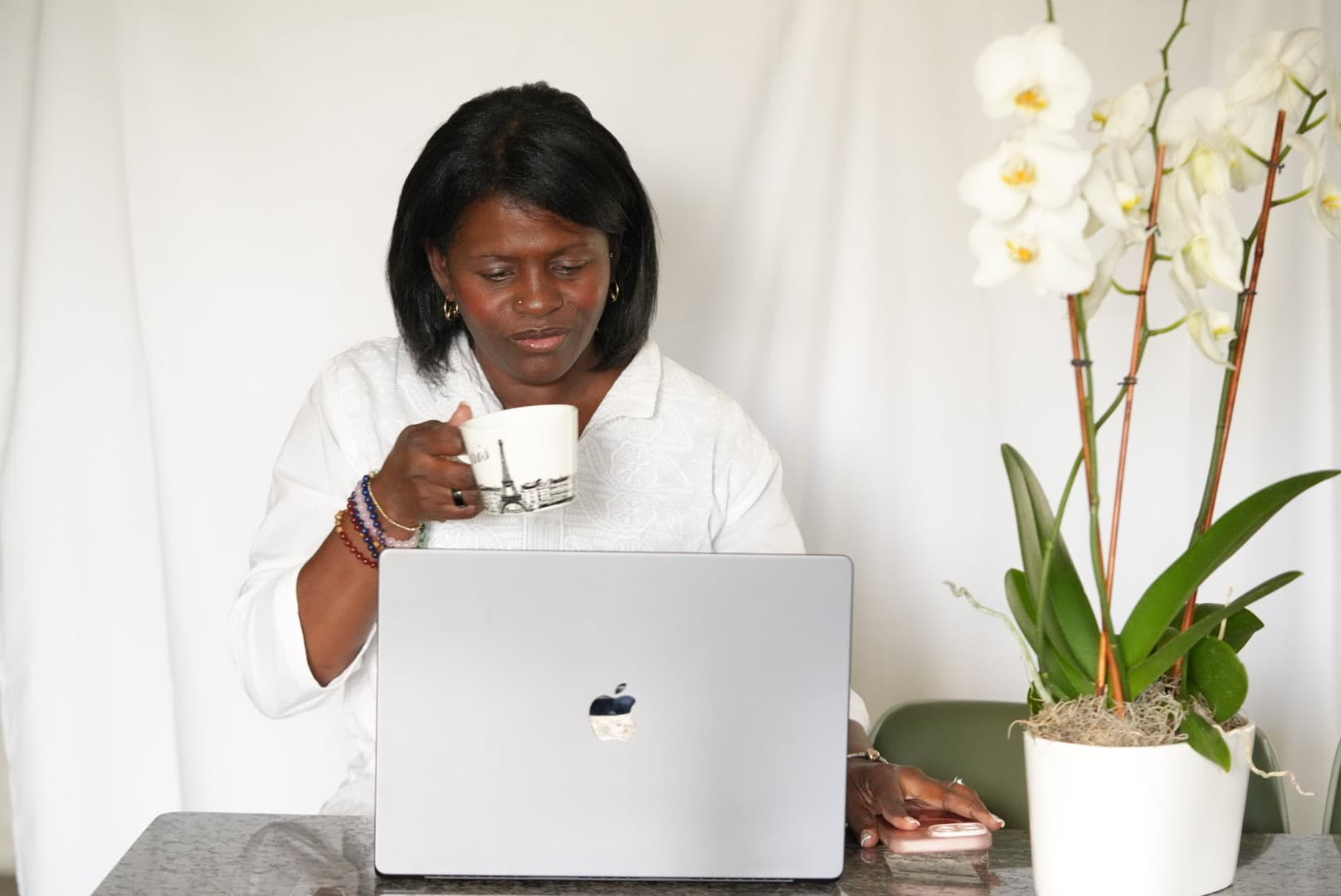 Giselle, a reinvention coach, in her warm home office